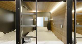 Хостел Капсула Москва Кровать «Комфорт» в общем номере для мужчин, собственные ванные комнаты-1
